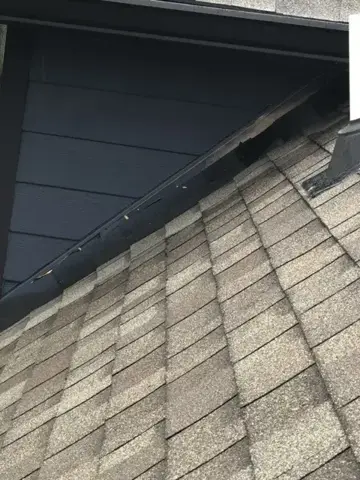 Shingle roof and wall flashing detail