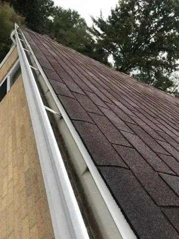Shingle roof edge viewed along the eave