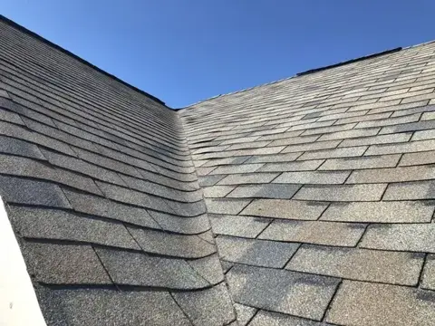 Intersecting roof slopes and shingle valley detail